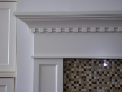 a close up of a fire place in a kitchen
